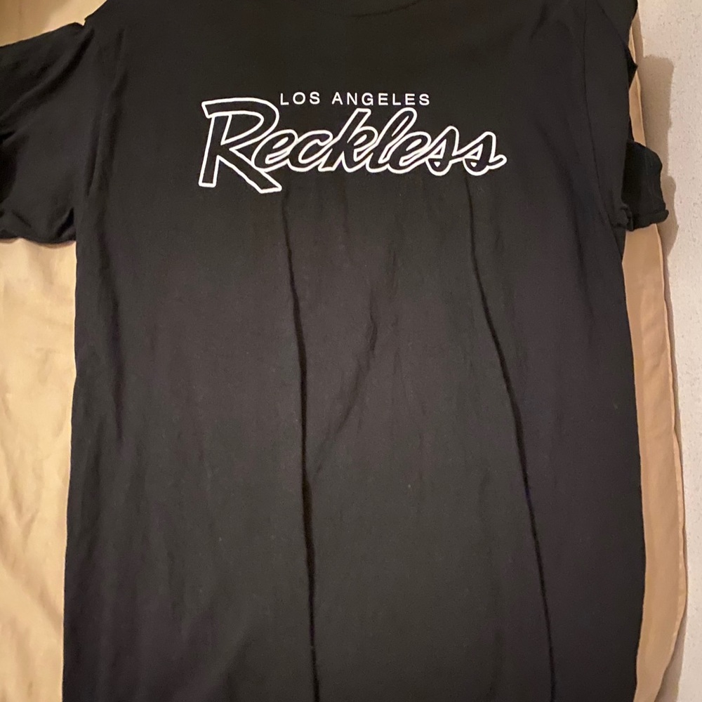 La reckless tee wore once